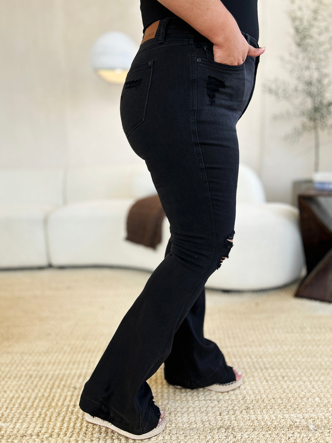 Judy Blue Full Size High Waist Distressed Flare Jeans - Premium Jeans from Trendsi - Just $46.99! Shop now at 5th & Barnett Online Boutique