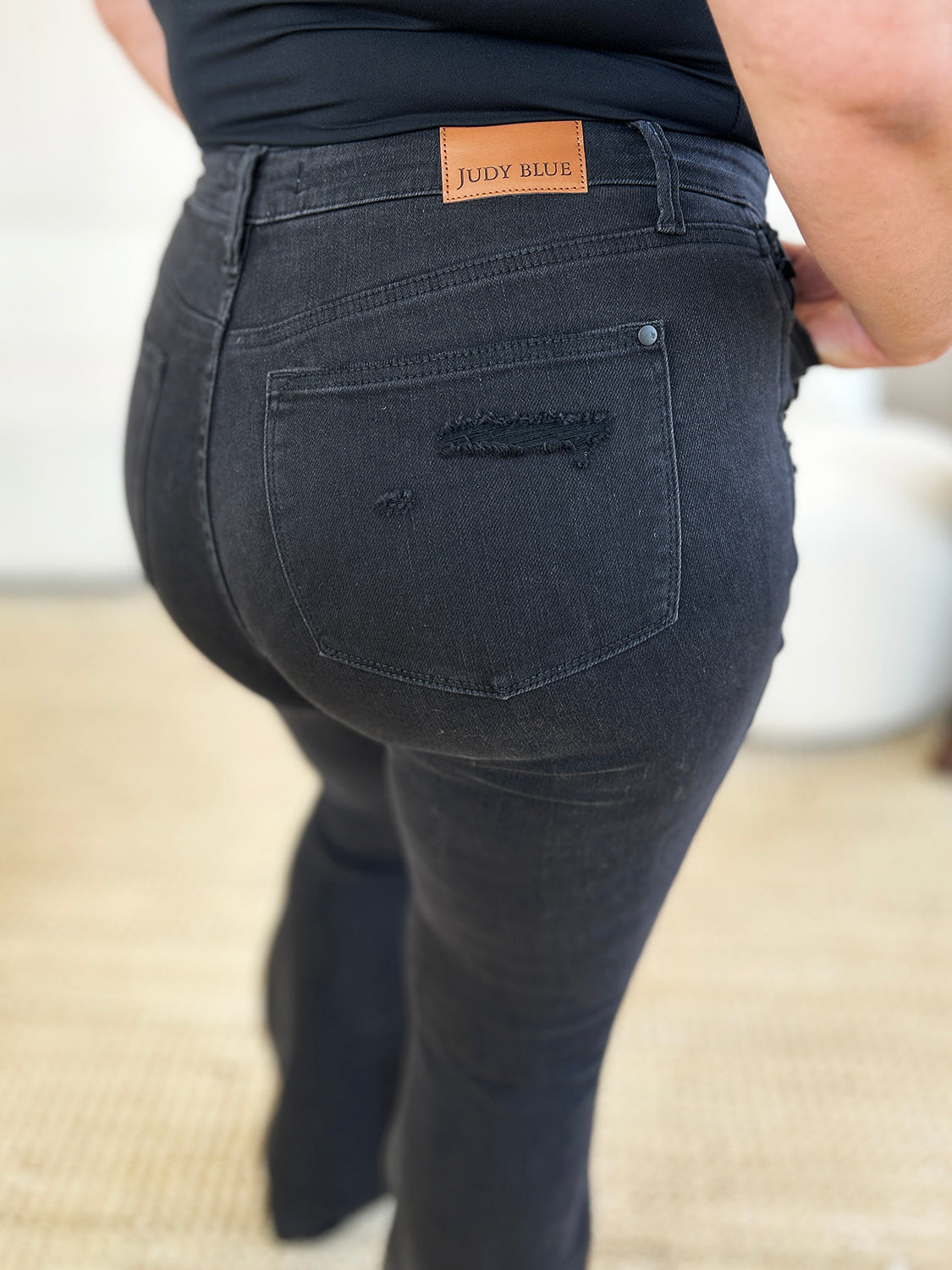 Judy Blue Full Size High Waist Distressed Flare Jeans - Premium Jeans from Trendsi - Just $46.99! Shop now at 5th & Barnett Online Boutique