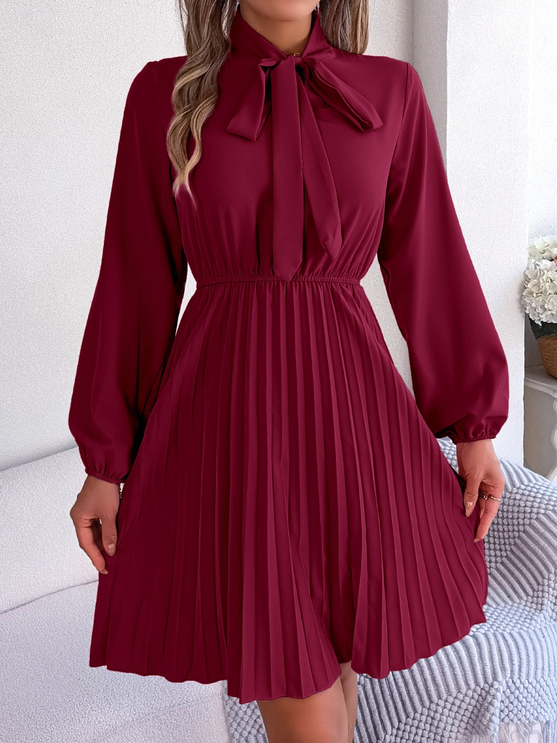 Tie Neck Balloon Sleeve Pleated Dress - Premium Women's Clothing from 5th & Barnett Online Boutique - Just $25.99! Shop now at 5th & Barnett Online Boutique