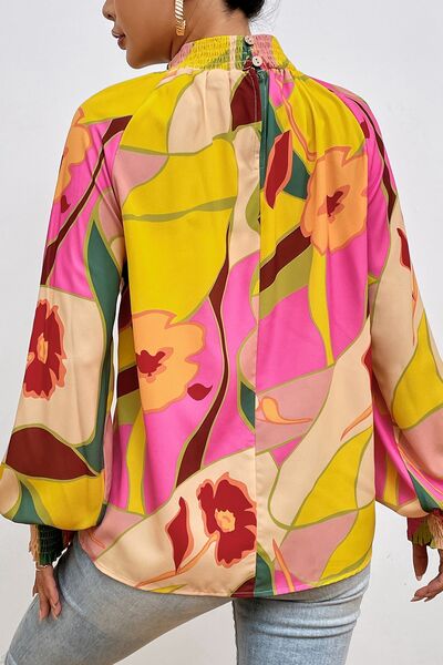 Floral Smocked Lantern Sleeve Blouse - Premium from 5th & Barnett Creative Fashions - Just $21.99! Shop now at 5th & Barnett Online Boutique