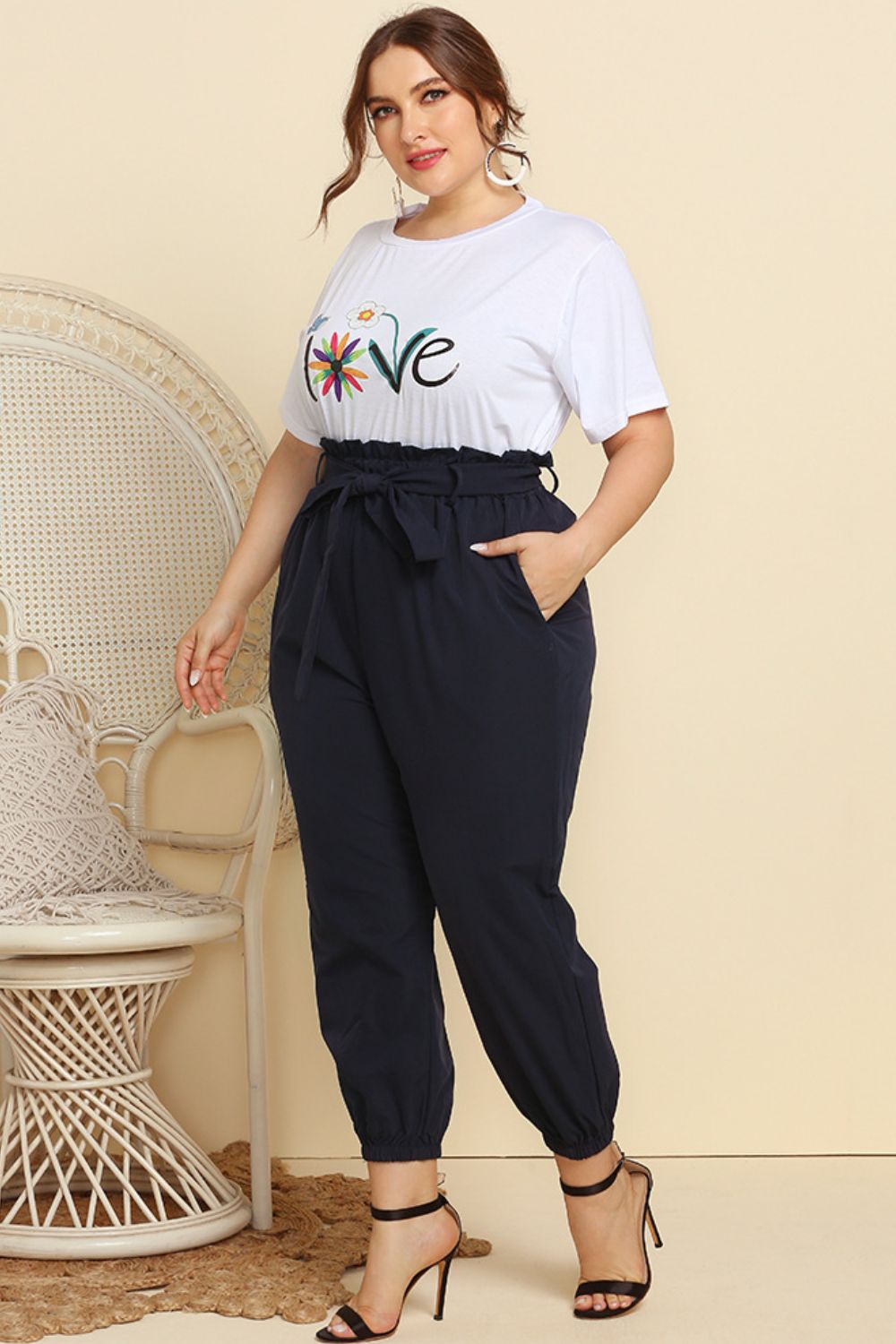 Graphic Tee and Belted Paperbag Joggers Set - Premium Jumpsuits & Rompers from 5th & Barnett Creative Fashions - Just $37.99! Shop now at 5th & Barnett Creative Fashions
