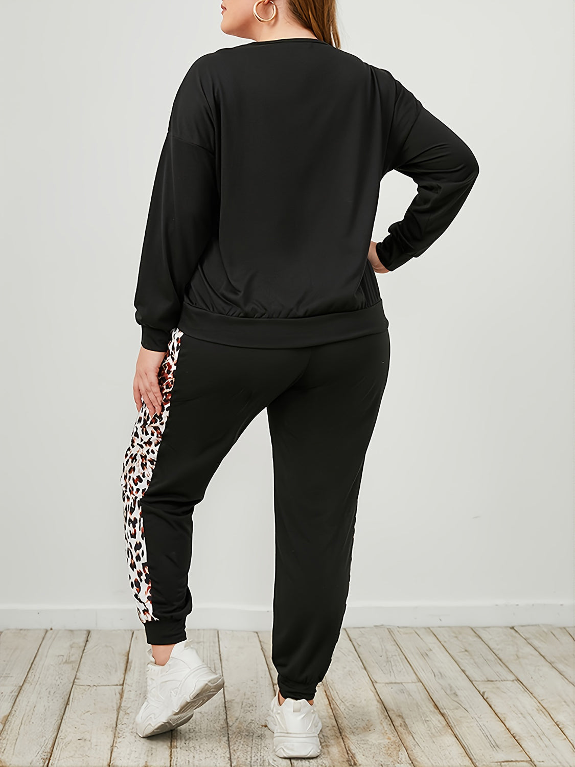Plus Size Leopard Sweatshirt and Sweatpants Set - Premium Activewear from 5th & Barnett Online Boutique - Just $32.99! Shop now at 5th & Barnett Online Boutique