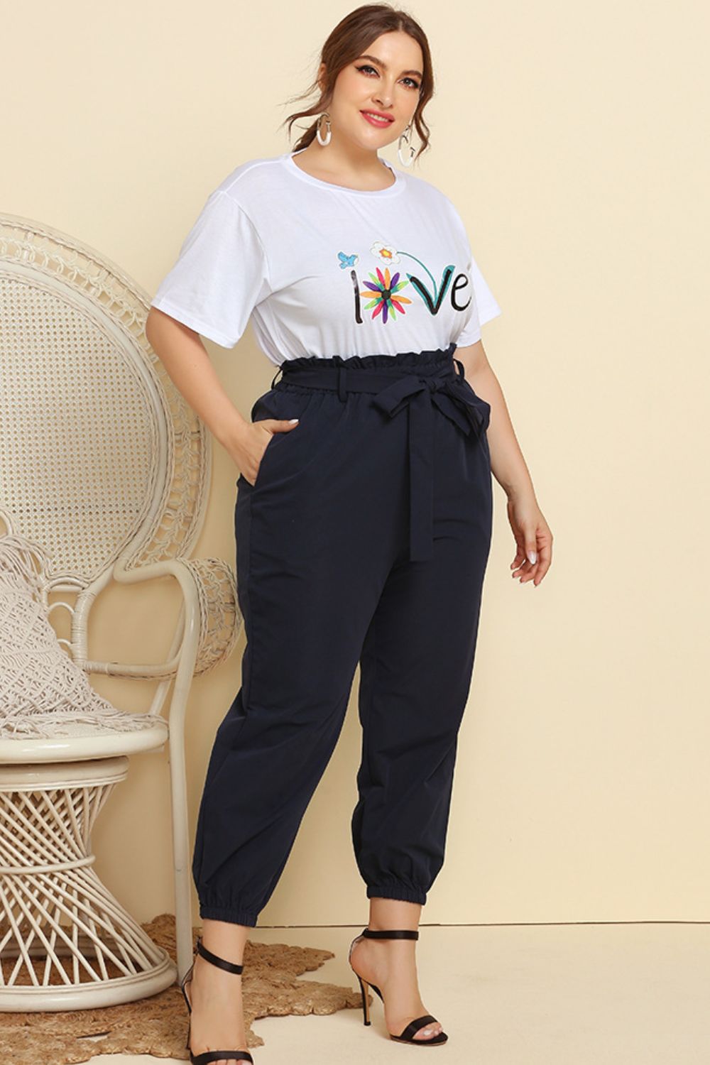 Graphic Tee and Belted Paperbag Joggers Set - Premium Jumpsuits & Rompers from 5th & Barnett Creative Fashions - Just $37.99! Shop now at 5th & Barnett Creative Fashions