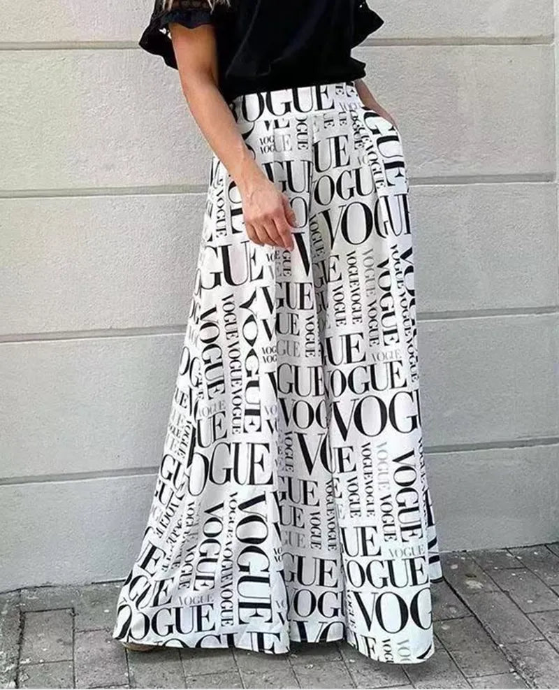 Trendy Vogue Print Bell Bottom Pants - Premium Women's Clothing from 5th & Barnett Creative Fashions - Just $25.99! Shop now at 5th & Barnett Online Boutique 