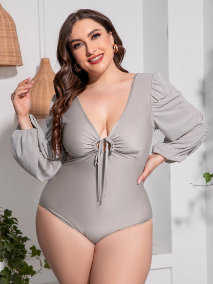 Plus Size Tied Deep V Balloon Sleeve One-Piece Swimsuit - Premium Lingerie & Underwear from 5th & Barnett Creative Fashions - Just $32.99! Shop now at 5th & Barnett Creative Fashions 