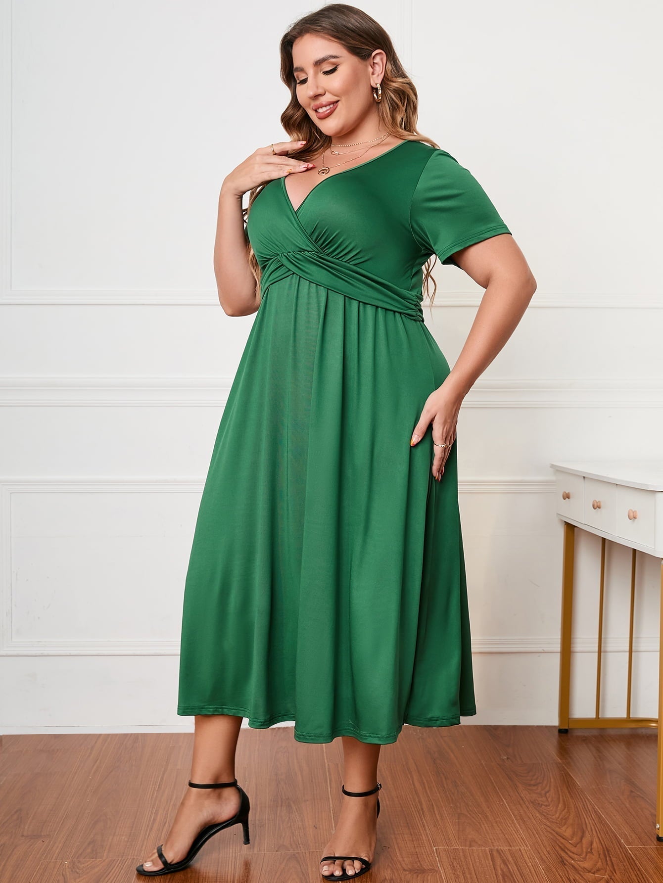 Plus Size Short Sleeve Surplice Neck Midi Dress - Premium Dresses from 5th & Barnett Creative Fashions - Just $35.99! Shop now at 5th & Barnett Creative Fashions 