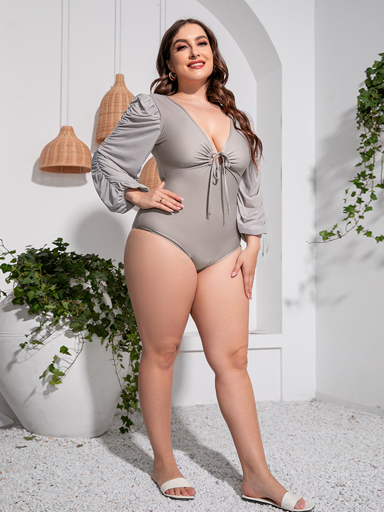 Plus Size Tied Deep V Balloon Sleeve One-Piece Swimsuit - Premium Lingerie & Underwear from 5th & Barnett Creative Fashions - Just $32.99! Shop now at 5th & Barnett Creative Fashions 