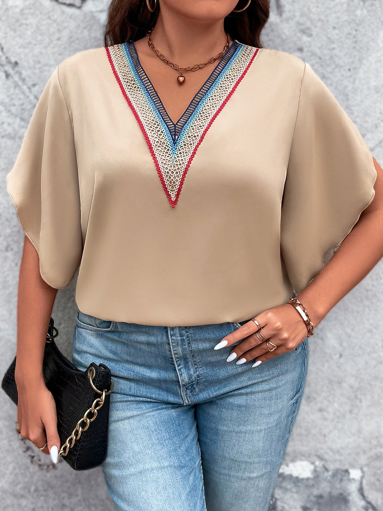 Plus Size V-Neck Flutter Sleeve Blouse - Premium Tops & Blouses from 5th & Barnett Creative Fashions - Just $24.99! Shop now at 5th & Barnett Creative Fashions 