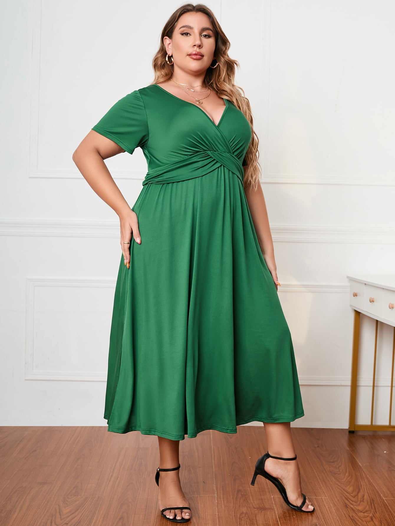 Plus Size Short Sleeve Surplice Neck Midi Dress - Premium Dresses from 5th & Barnett Creative Fashions - Just $35.99! Shop now at 5th & Barnett Creative Fashions 