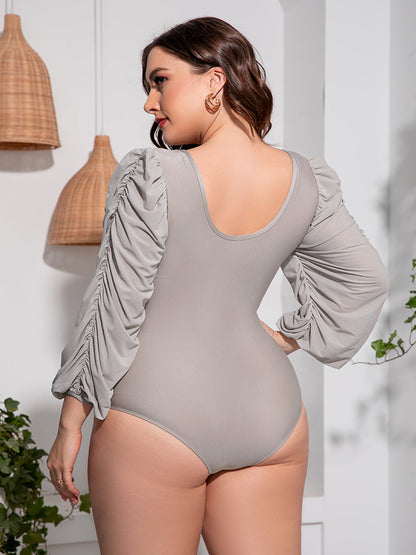 Plus Size Tied Deep V Balloon Sleeve One-Piece Swimsuit - Premium Lingerie & Underwear from 5th & Barnett Creative Fashions - Just $32.99! Shop now at 5th & Barnett Creative Fashions 