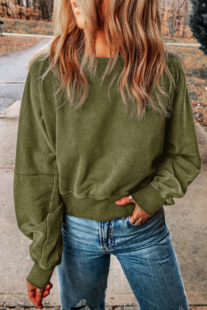 Double Take Round Neck Open Back Sweatshirt - Premium  from 5th & Barnett Creative Fashions - Just $26.99! Shop now at 5th & Barnett Creative Fashions 