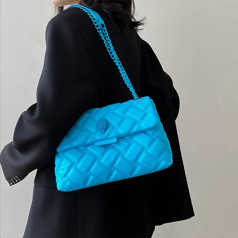 ANNRMYRS Quilted Eagle Metal Shoulder Bag - Premium Luggage & Bags from 5th & Barnett Online Boutique - Just $27.99! Shop now at 5th & Barnett Online Boutique 