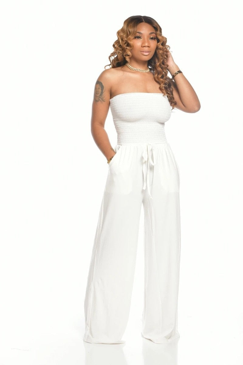 OFF SHOULDER SOLID COLOR SMOCKED JUMPSUIT - Premium  from 500 products - Just $44.99! Shop now at 5th & Barnett Creative Fashions 