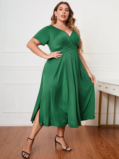 Plus Size Short Sleeve Surplice Neck Midi Dress - Premium Dresses from 5th & Barnett Creative Fashions - Just $35.99! Shop now at 5th & Barnett Creative Fashions 