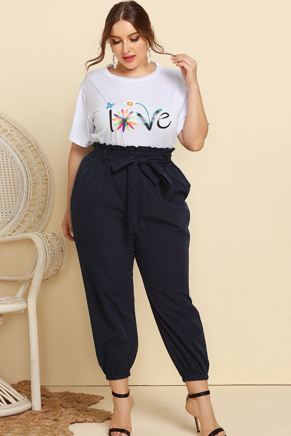 Graphic Tee and Belted Paperbag Joggers Set - Premium Jumpsuits & Rompers from 5th & Barnett Creative Fashions - Just $37.99! Shop now at 5th & Barnett Creative Fashions 