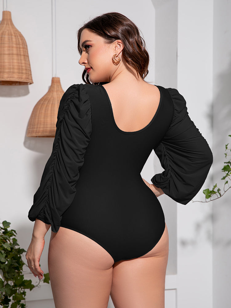 Plus Size Tied Deep V Balloon Sleeve One-Piece Swimsuit - Premium Lingerie & Underwear from 5th & Barnett Creative Fashions - Just $32.99! Shop now at 5th & Barnett Creative Fashions 